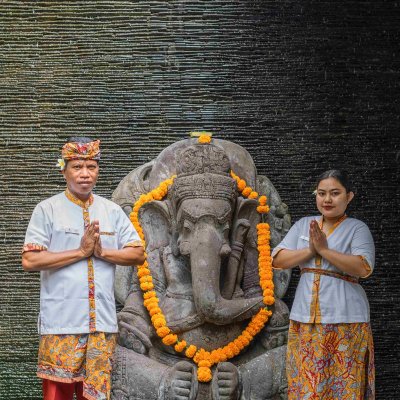 Villa Tiga Puluh, a modern tropical villa featuring a private pool, open-air living spaces, lush gardens, and Balinese-inspired architecture for a relaxing stay.